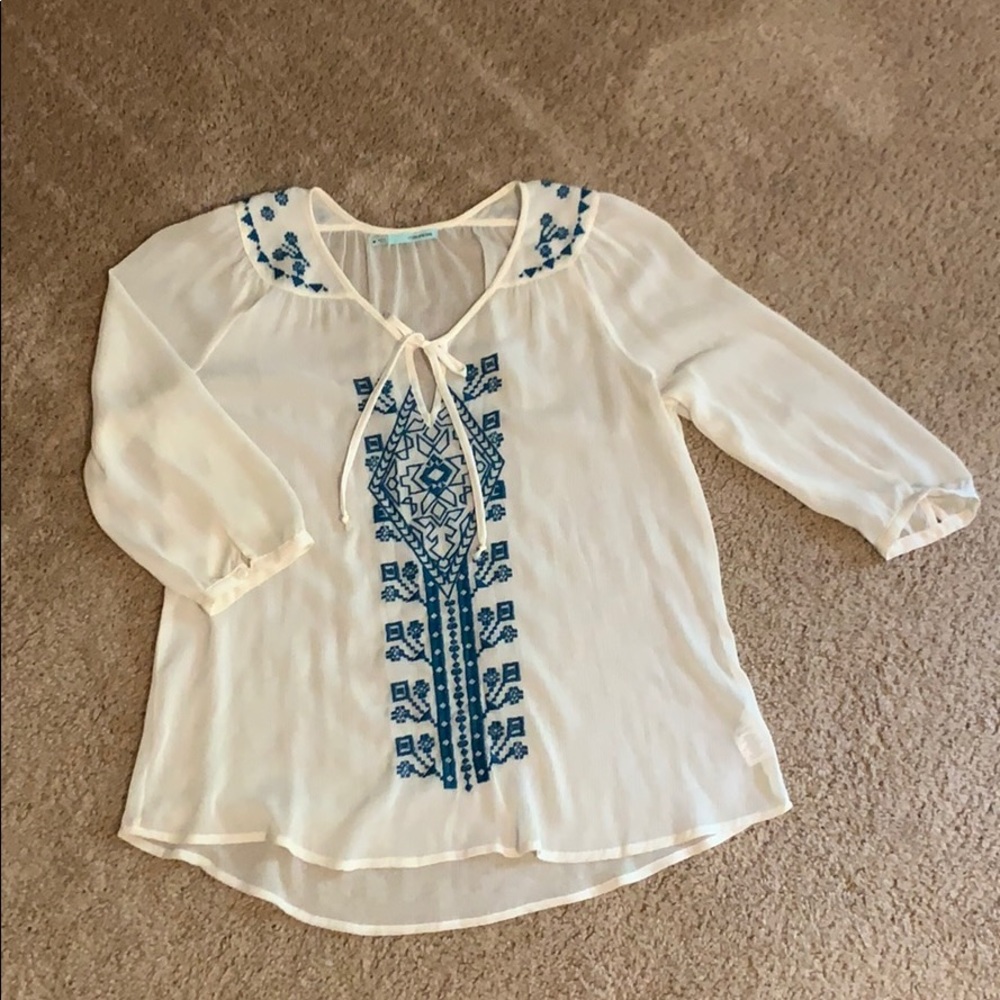 Sheer, cream, peasant top with teal embroidery